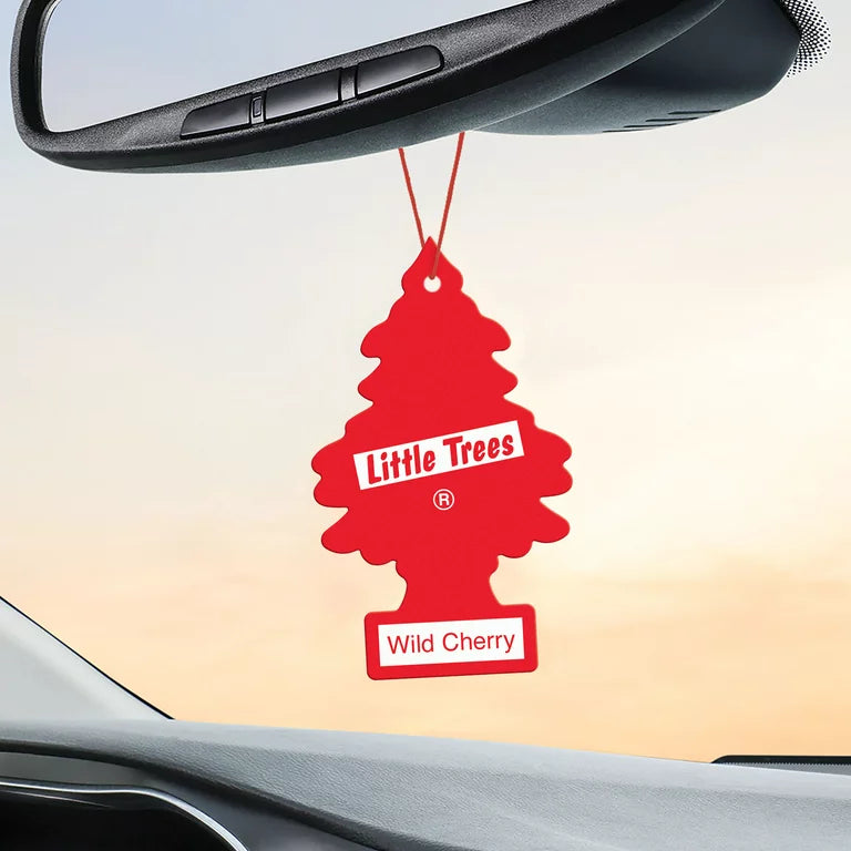 Little Tree Wild Cherry Air Freshener Hanging in Car